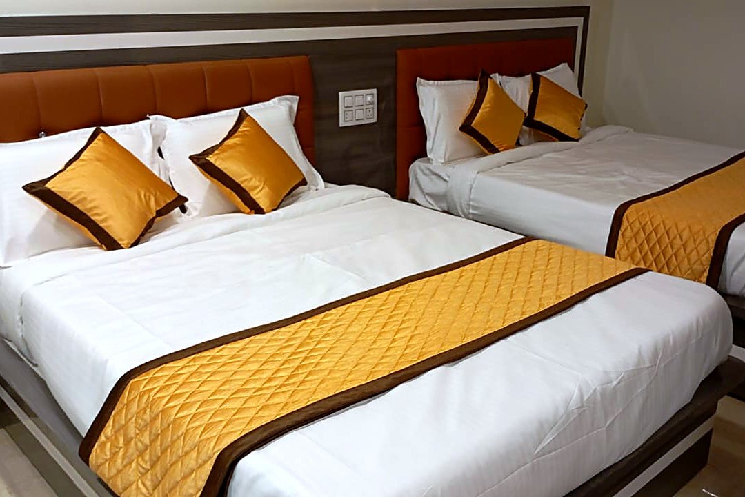 Suite Room beds with gold runners