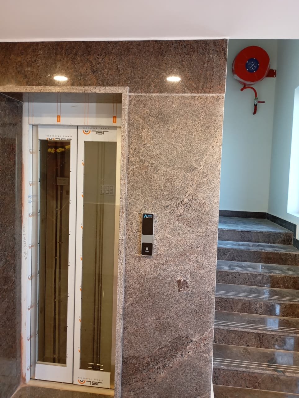 Lift, staircase and fire hose reel at Aadya Inn Tirupati