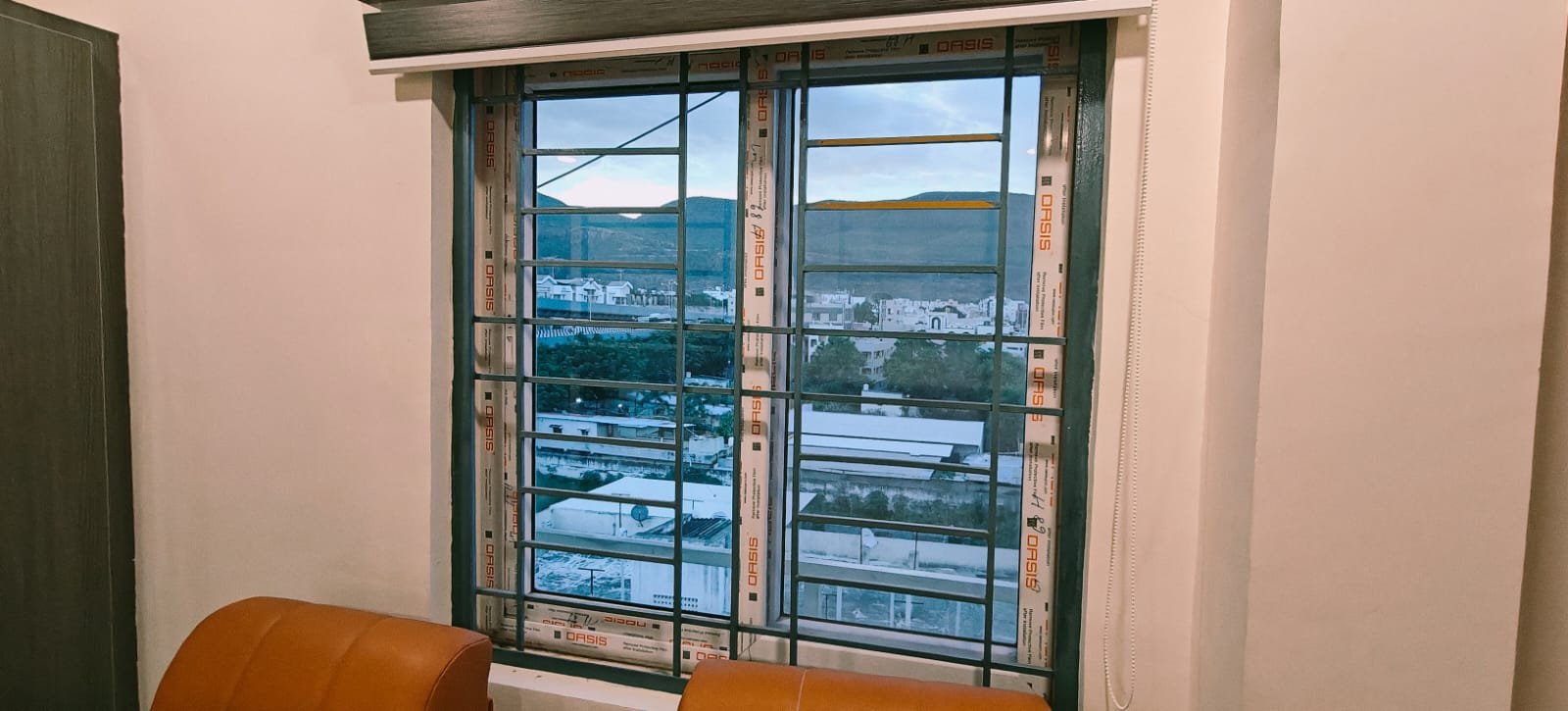 View of the hills from a room window at Aadya Inn Tirupati