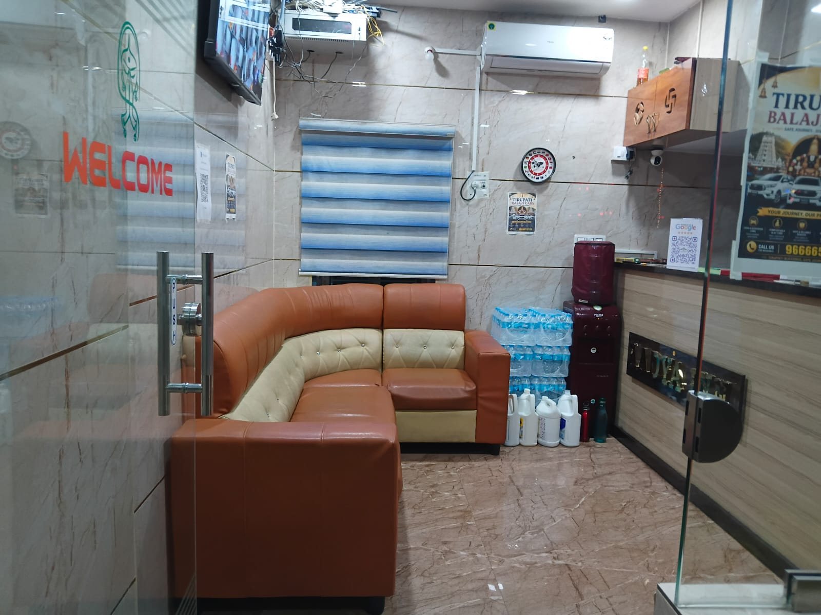 Guest seating in the front office at Aadya Inn Tirupati