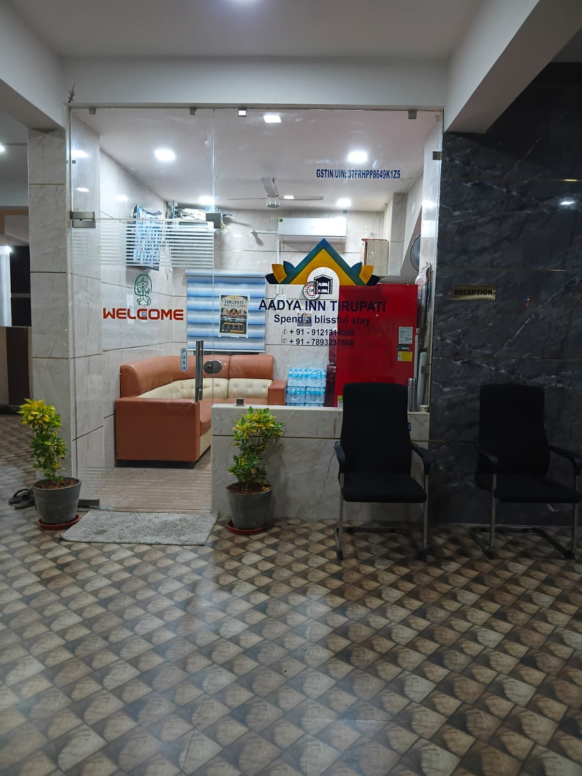 Front office seen from the lobby at Aadya Inn Tirupati